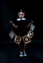 Load image into Gallery viewer, Girl wearing dress, Girl holding "Boo" sign 